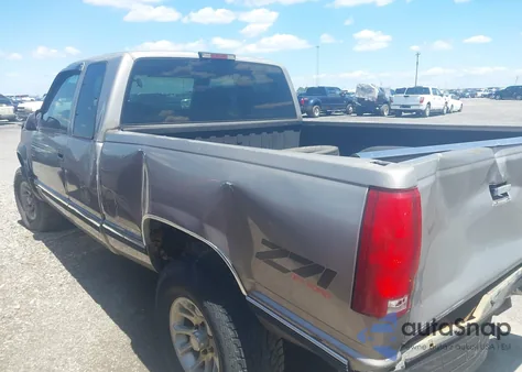 1998 Chevrolet K1500 Fleetside z USA, uszkodzony, nr VIN 2GCEK19R3W1111923